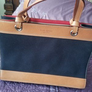 Cute cloth and leather medium sized bag.